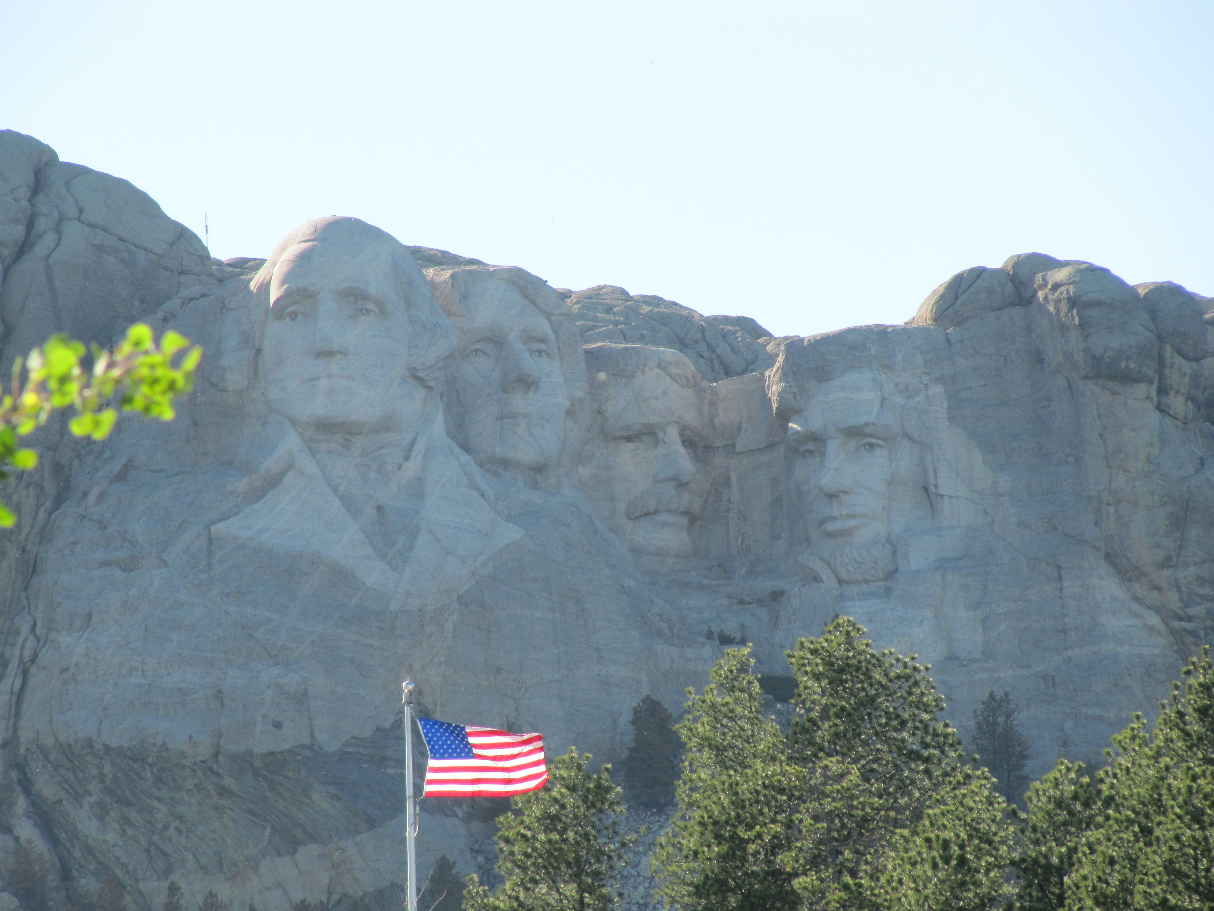 The dead presidents faces peek out of Mount Rushmore